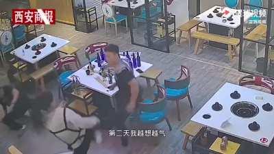 A video clip spread of a Chinese waitress severely beating two young men after they harassed her.