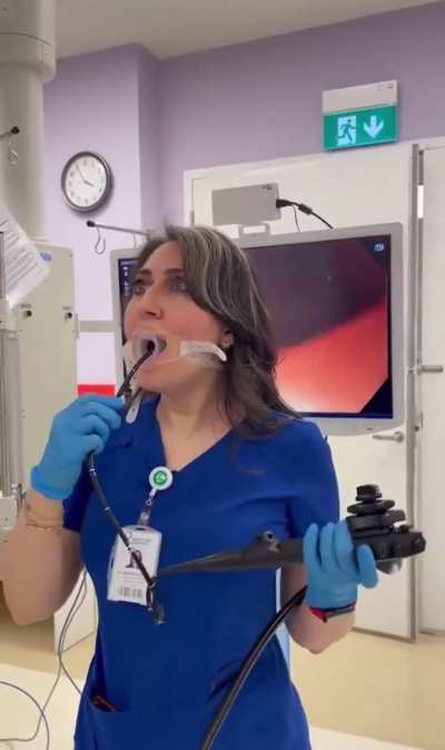 A doctor performing self-endoscopy