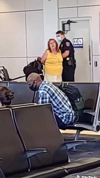 Drunk lady has a screaming meltdown in the airport for everyone to see