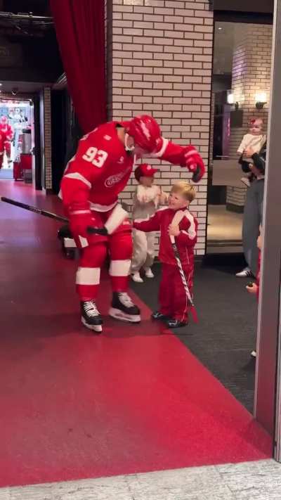Baby Larkin joins the Red Wings' pregame fist-bump line