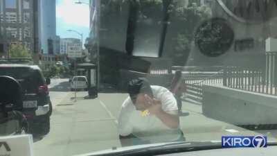 Seattle BLM surrounding and yelling at a KIRO7 news crew outside the KC jail, with one man threatening the reporter