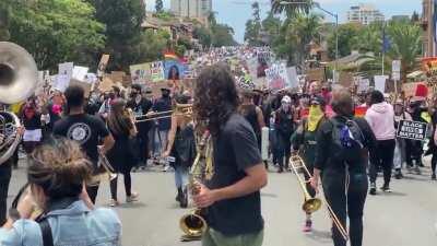 A live band joined the protest march up 6th today. It was a massive, peaceful event!