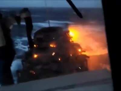 (2019) Cars getting transported on an open deck catch on fire after salty water shorts their batteries