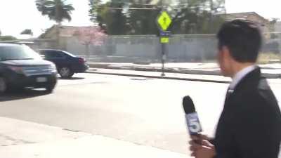LA News crew does a story about the most dangerous intersection in the area and witnesses an accident live.