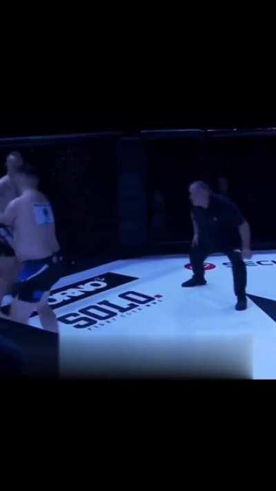 Two armless guys fighting each other in a sanctioned MMA event
