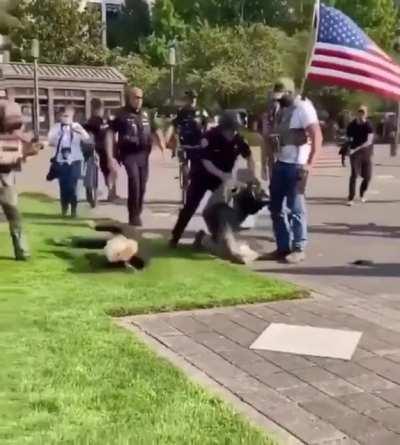 That cop was an inch from getting knocked out