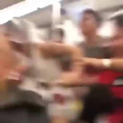 Baby shark is being sung by adults for a little girl.