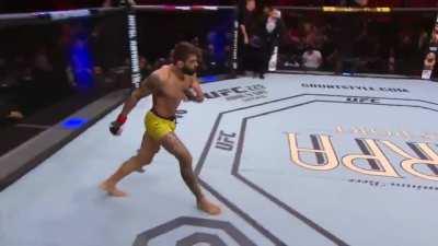 Sean Strickland taking a head kick instead of giving one.