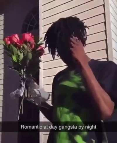 Carti bringing rubi rose flowers