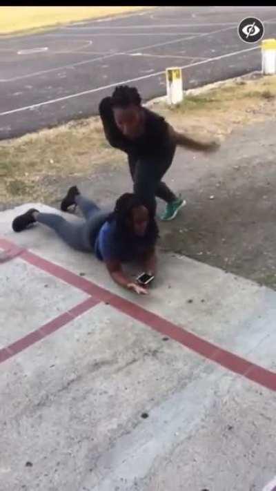 Jamaican girl beats down a women