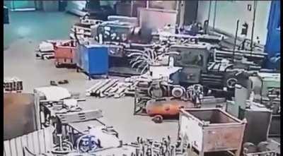 Man accidentally touches the moving machine