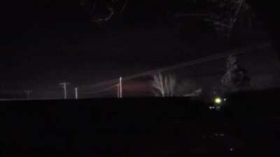 Red pulsating light in the night sky