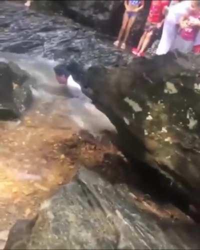 Guy was walking too close to the edge of the waterfall