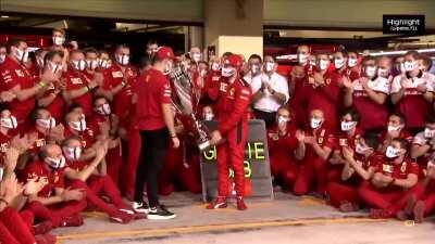 Ferrari's final farewell to Seb after the race outside the garage, along with a big cup they've bought him.
