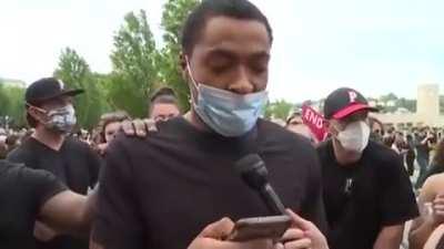 Fireman Terrell Paci gives an emotional speech on when he was racially profiled by police, who approached him earlier in the week with guns drawn while he was in uniform in front of his fire house.