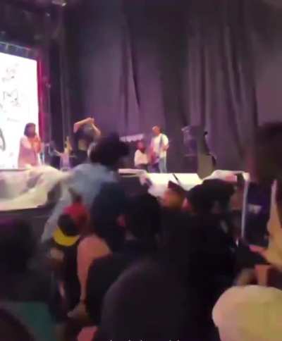 Police tried to punch crowdsurfer mid-performance, not realizing he was the band's lead singer.