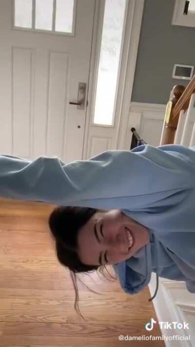 Charli Damelio stuck in a bannister