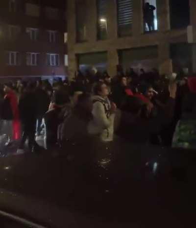 Moroccan soccer fans in the Netherlands chant 