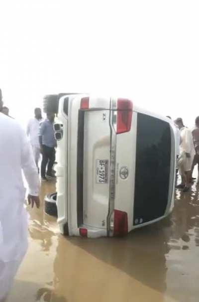 Drifting a Land Cruiser on a beach
