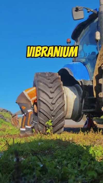 Changing a traktor's tire 