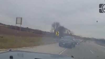 Crazy driver forgets to steer back into his lane and crashes