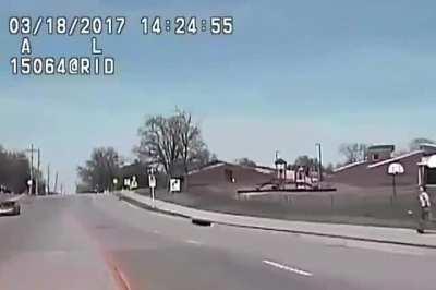 Woman ran over by police after shooting at them