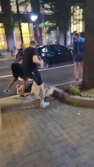 Protesters stand up to vandalizers