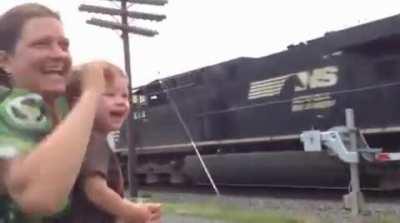 Engineer's Son Realizes His Dad is Driving Passing Train
