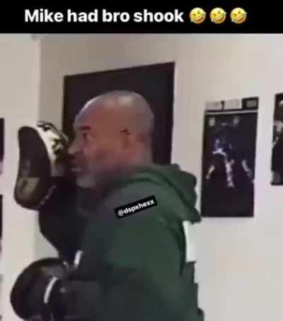Mike has laid hands on his trainer before. That brother had flashbacks.