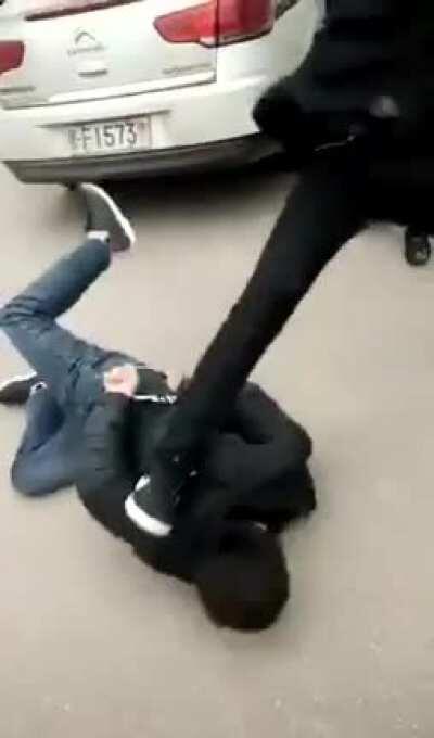 Chinese Police savagely beat Uighur who is in handcuffs