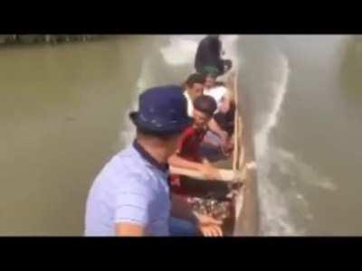 Enjoying a motorised fishing boat, cruising through reeds and the river channels