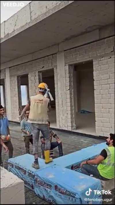 Construction workers hold fashion show