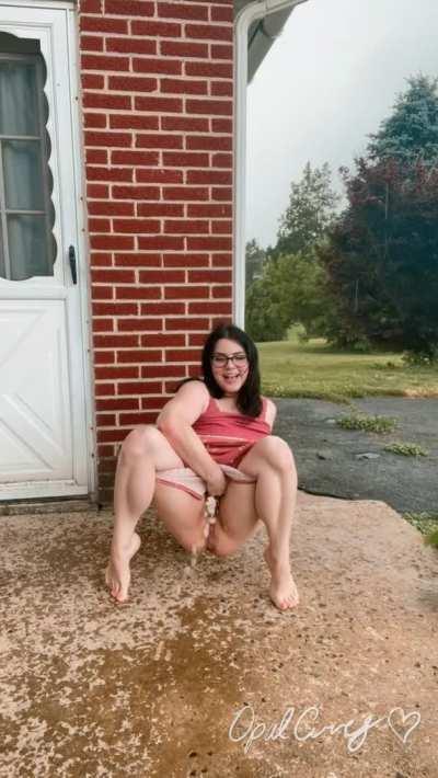 Peeing outside during a rain storm