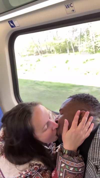 Interracial soft core kissing on the train