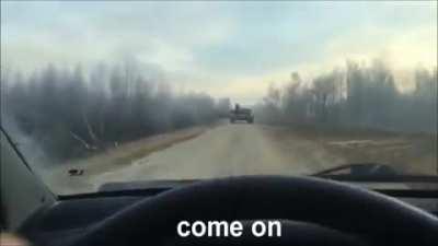 Guy plays chicken with a tank