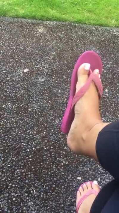 I just love playing with and dangling my flip flops