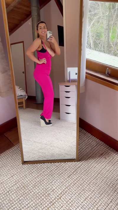 just a milf with some semi decent tits spilling out of her dress hehe 😅