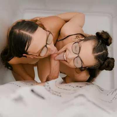 A steamy encounter unfolds between hot lookalikes Izzy and Spencer with nerdy Van , exploring the allure of girls in glasses. A wild double blowjob and a cum-filled threesome add to the intensity.
