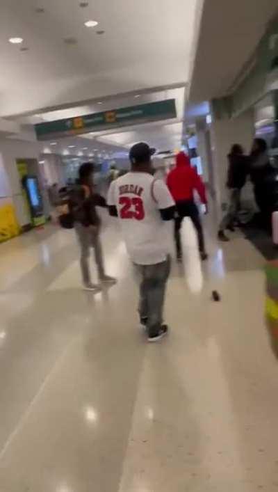 Brawl between about a dozen people inside the Minneapolis airport