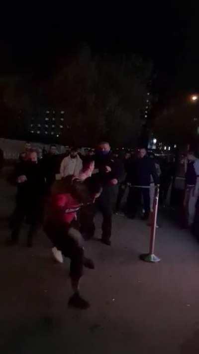 Dude tries to fly kick a bodyguard