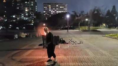 This guy lights his sword on fire and makes a cool little demonstration with it, then puts it out with his sheath/scabbard