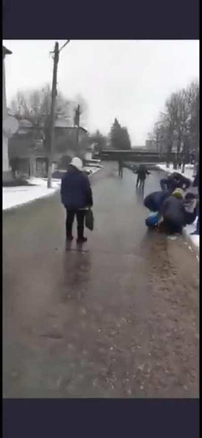 Ukrainian protester shot in the leg by Russian army.