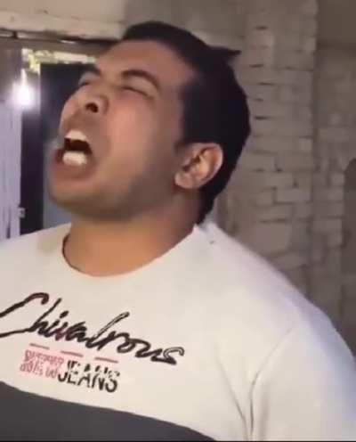 Guy Eats Burning Coal