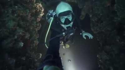 Falling into a hole underwater while Scuba Diving