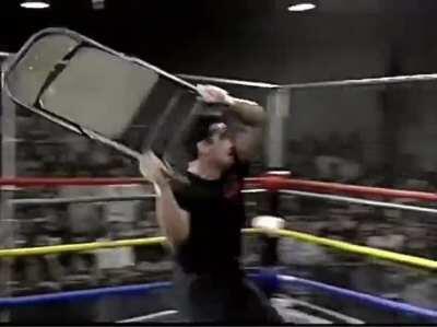 A hard chairshot from Tommy Dreamer. Classic ECW moment
