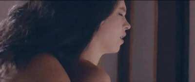 Otmara Marrero kissing Sydney Sweeney's neck in Clementine