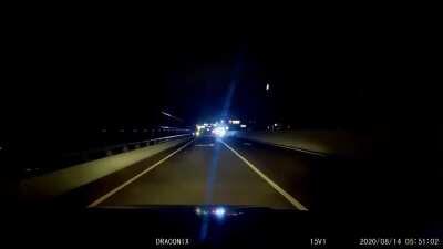 [USA] Driver crosses into oncoming lanes to run a red light, doesn't look behind car first