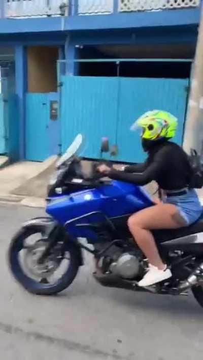 Trying to look cute while riding a motorcycle and crashing it