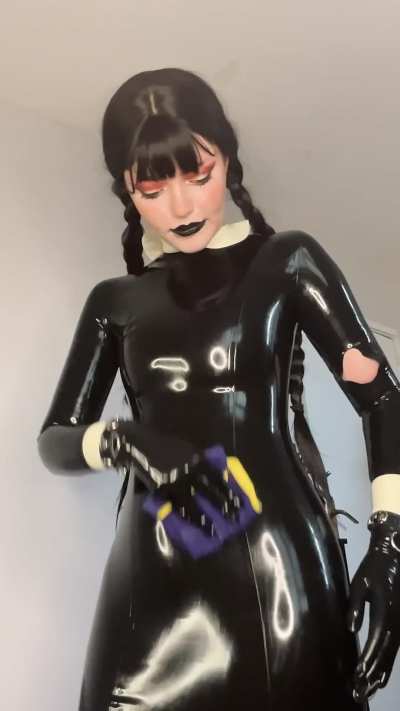 Shining my latex Wednesday Addams cosplay