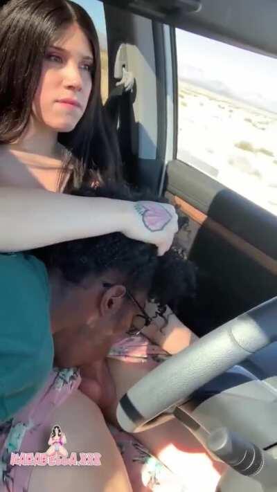 Karabella gets a blowjob while driving her car (gif)